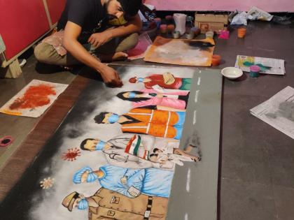 The artist from Solapur gave a unique salute to the Kovid warriors through Rangoli ... | सोलापूरच्या कलाकाराने रांगोळीच्या माध्यमातून कोविड योद्ध्यांना केला अनोखा सलाम...