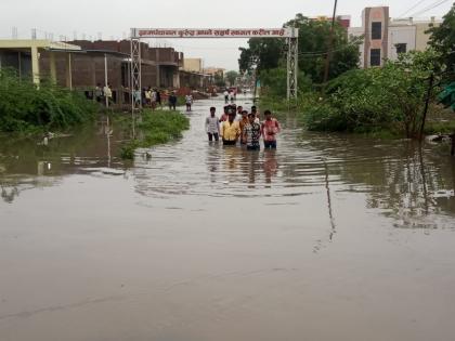 Flood of Asna river in Hingoli; Kurunda, Koutha villages hits badly | हिंगोलीत असना नदीचे उग्ररुप; कुरुंदा, कौठा गावांना पुराचा तडाखा