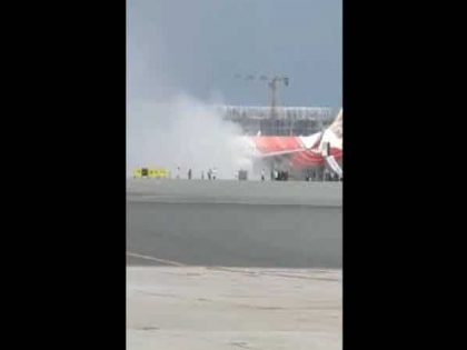 Air India Plane Fire: Fire on Air India plane, confusion among passengers; 14 injured in stampede | Air India Plane Fire: एअर इंडियाच्या विमानाला आग, प्रवाशांमध्ये गोंधळ; चेंगराचेंगरीत 14 जखमी