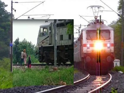 The father stood in front of the fast-moving train with his son by his side, a strange reason came to light | Railway: मुलाला कडेवर घेऊन भरधाव ट्रेनसमोर उभे राहिले वडील, समोर आलं अजब कारण