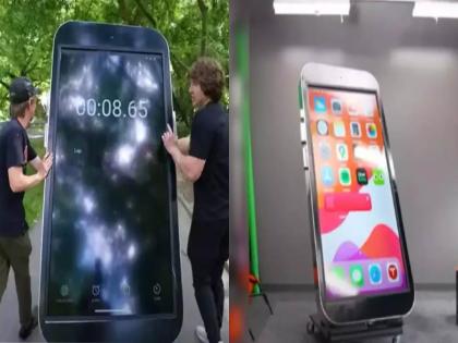 youtuber mathew create worlds largest i phone of 8 foot height suprasses previous record | YouTuber ने 8 फुटांचा iPhone बनवला! मोबाईल रिव्ह्यूसाठी नेला, लोक म्हणाले...