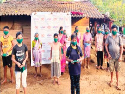 One lakh masks distributed in tribal areas | आदिवासी पाड्यांत एक लाख मास्कवाटप; अदानी इलेक्ट्रिसिटीचा उपक्रम