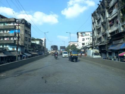 Even after the onset of rains, the pits in Bhiwandi are still there; Harassing citizens with dust | पावसाच्या उसंत नंतरही भिवंडीतील खड्डे जैसे थेच ; धुळीने नागरिक हैराण