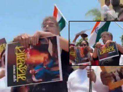 Jitendra Awhad protest against Manusmriti, tore Babasaheb Ambedkar photo; Apologized when the mistake was realized | जितेंद्र आव्हाडांनी फाडला बाबासाहेब आंबेडकरांचा फोटो; चूक लक्षात येताच मागितली माफी