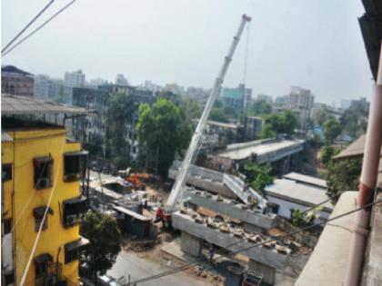 Seven girders of the flyover enter Dombivli; Shiv Sena starts work by breaking coconut | उड्डाणपुलाचे सात गर्डर डोंबिवलीत दाखल; शिवसेनेकडून नारळ फोडून कामाचा प्रारंभ