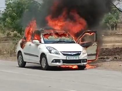 Burning car on Kalamanuri road; Fortunately, the driver and passengers survived | कळमनुरी रस्त्यावर बर्निंग कारचा थरार; सुदैवाने चालकासह प्रवासी बचावले Burning car on Kalamanuri road; Fortunately, the driver and passengers survived | कळमनुरी रस्त्यावर बर्निंग कारचा थरार; सुदैवाने चालकासह प्रवासी बचावले