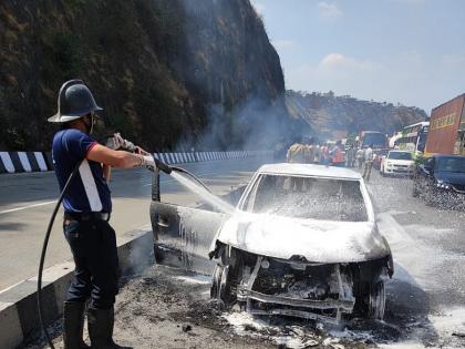 Car burnt near Khandala tunnel on Mumbai-Pune Expressway pune latest news | Pune | मुंबई-पुणे एक्स्प्रेस वेवर खंडाळा बोगद्याजवळ कार जळून खाक