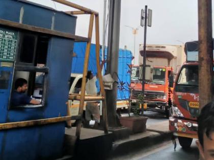 Kharghar toll spraying system to stop pollution from vehicles, system operational from today | वाहनांपासून प्रदूषण थांबविण्यासाठी खारघर टोल स्प्रेईंग यंत्रणा, आजपासून यंत्रणा कार्यान्वित