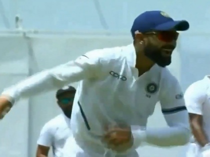 India vs West Indies, 1st Test : WATCH - Virat Kohli's Dandiya dance moves on the ground gives fans Navratri feel | India vs West Indies, 1st Test : कर्णधार विराट कोहलीचा दांडिया डान्स, व्हिडीओ व्हायरल