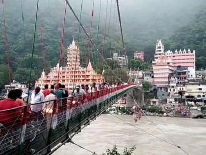 A foreign girl shot a nude video on Laxman Jhula, released after arrest | लक्ष्मण झुल्यावर विदेशी युवतीने शूट केला न्यूड व्हिडीओ, अटकेनंतर सुटका