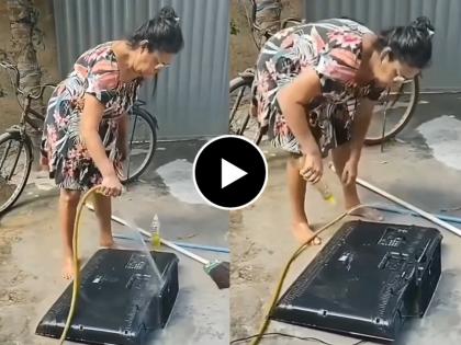 A funny video of women clean LED tv by using water and foam  video goes viral on social media | काकूबाई रॉक्स नेटकरी शॉक्स! चक्क एलईडी टीव्हीची केली पाण्याने सफाई