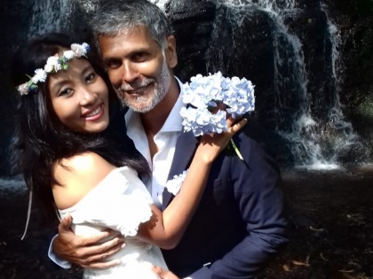 milind soman and ankita marry again barefoot wedding in spain | SEE PICS : मिलिंद सोमण आणि अंकिता कुंवरने केले barefoot wedding!
