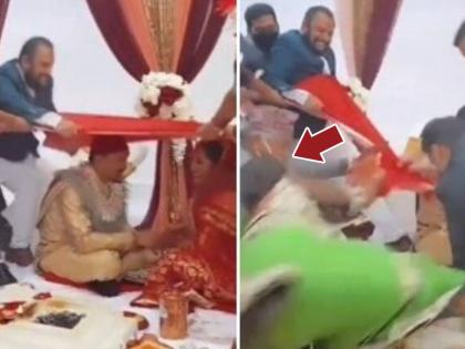 bride and groom relatives fight for one clothe funny video goes viral on internet | फक्त एका कापडावरून लग्नात भिडले वधु आणि वराकडील मंडळी, वाद केला विकोपाला अन्...