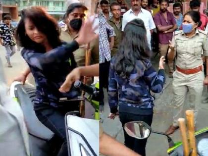 Video: young woman park scooter in the no parking, female PSI slapped her after argument | Video: तरुणीने एकतर नो पार्किंगमध्ये स्कूटर लावली, पोलिसांशी हुज्जत घातली; महिला पीएसआय येताच...