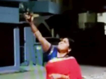 in uttar pradesh bjp women wing leader manju tiwari celebratory firing to defeat coronavirus kkg | CoronaVirus: गो कोरोना गो; देश दिवे लावत असताना भाजपाच्या जिल्हाध्यक्षांचा हवेत गोळीबार