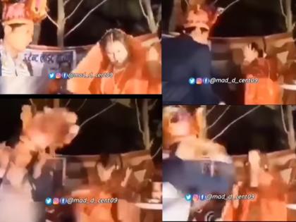 bride and groom fights on the stage video goes viral | लग्नमंडपातच एकमेकांच्या कानशिलात लगावल्या वधुवराने, स्टेजवर केली तुफान हाणामारी