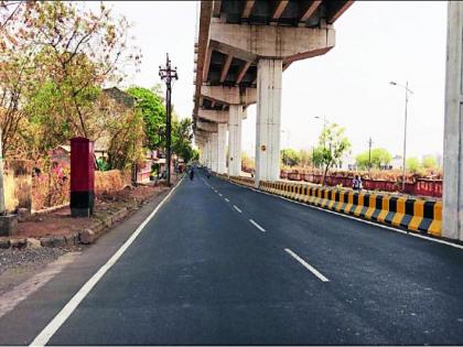 Width of road made by metro in Nagpur | नागपुरात मेट्रोने केले रस्ता रुंदीकरण