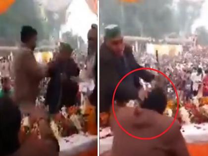 Uttar pradesh | Unnao farmer slaps BJP MLA Pankaj Gupta on stage, video goes viral on social media | भरसभेत शेतकऱ्याने भाजप आमदाराला मारली चापट, व्हिडिओ सोशल मीडियावर व्हायरल