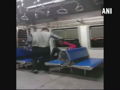 woman molested in thane cst local train | VIDEO: धक्कादायक! ठाणे-सीएसटी लोकलमध्ये मित्राशी झालेल्या वादावादीतून महिलेला मारहाण करत विनयभंग