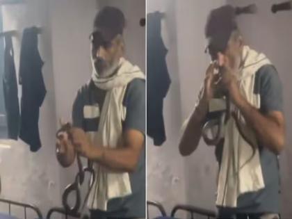 MP Snake Bite Cobra bites police officer to death | अनुभवी पोलीस कर्मचाऱ्याने हाताने पकडला नाग; मित्र व्हिडीओ काढत असतानाच चावा घेतला अन्...