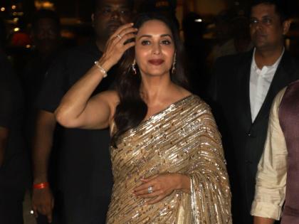 Fans were annoyed to see Madhuri Dixit's bold prediction in Amitabh Bachchan's party, see that photo | अमिताभ बच्चन यांच्या पार्टीतील माधुरी दीक्षितचा बोल्ड अंदाज पाहून हैराण झाले होते चाहते, पाहा तो फोटो