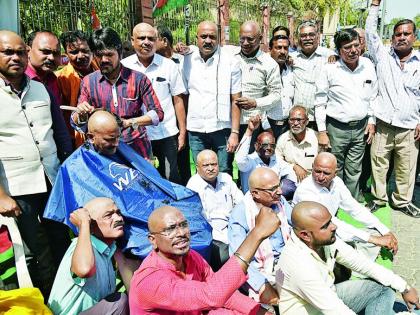 Teachers and employees of the Municipal Corporation become bald | मनपाच्या शिक्षक आणि कर्मचाऱ्यांनी केले मुंडण