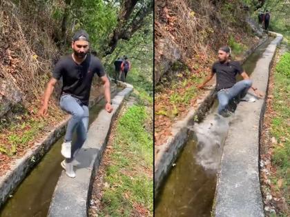 young man dancing on rrr movie natu natu song falls in gutter video goes viral | नाटु नाटु गाण्यावर युवकाने धरला ठेका, पण पडला गटारात! नेटकरी उडवतयात खिल्ली