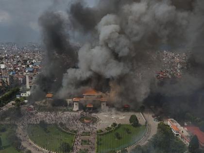 Situation in Nepal out of control, Prime Minister resigns, protesters set Parliament building on fire | नेपाळमधील परिस्थिती नियंत्रणाबाहेर, पंतप्रधानांचा राजीनामा, आंदोलकांनी संसद भवन पेटवले Situation in Nepal out of control, Prime Minister resigns, protesters set Parliament building on fire | नेपाळमधील परिस्थिती नियंत्रणाबाहेर, पंतप्रधानांचा राजीनामा, आंदोलकांनी संसद भवन पेटवले