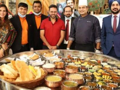 Ahmedabad restaurant serves 5-ft long Gujarati thali featuring dishes like Dhoni Khichdi, and Kohli Khaman