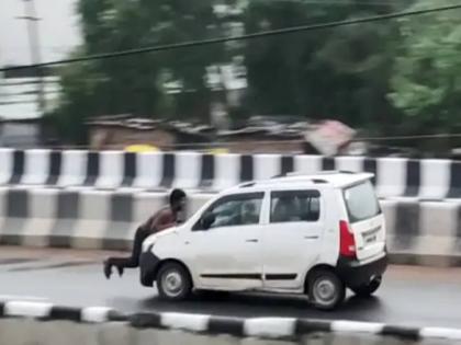 kanpur viral video one group hanged man on bonnet and ran car for many kilometers | VIDEO: 'त्या' व्यक्तीला कारच्या बोनेटवर टाकून बदमाश सुस्साट सुटले; धक्कादायक व्हिडीओ व्हायरल