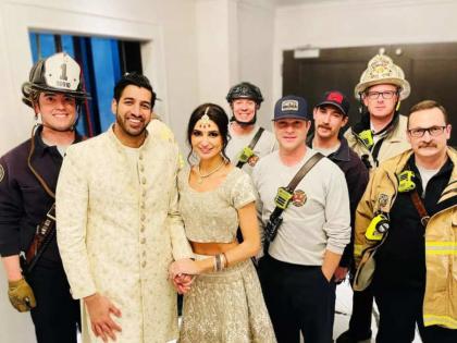 couple misses their wedding reception in us after getting stuck in a hotel lift watch video | स्वत:च्याच लग्नाच्या रिसेप्शमध्ये दोन तास उशीरा पोहोचलं कपल, वऱ्हाडी खोळंबले; पण कारण कळालं अन्...