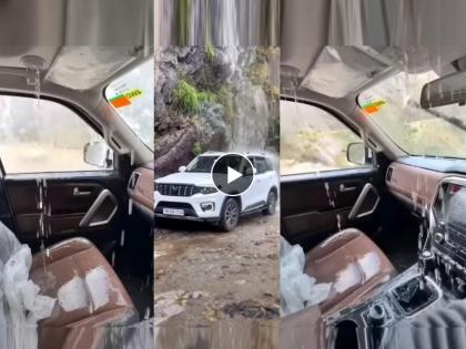 mahindra scorpio n sunroof leakage video viral suv under waterfall | पाणीच पाणी...! सनरुफ बंद असतानाही Mahindra Scorpio N मध्ये शिरलं पाणी, Video व्हायरल