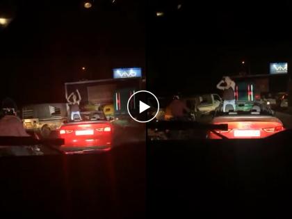 delhi girl dance on moving audi car people will enjoy video goes viral | भर रस्त्यात खुल्या कारमध्ये तरुणीनं केलं असं कृत्य की लोक म्हणाले...दीदी जरा कमी प्यायची ना! 