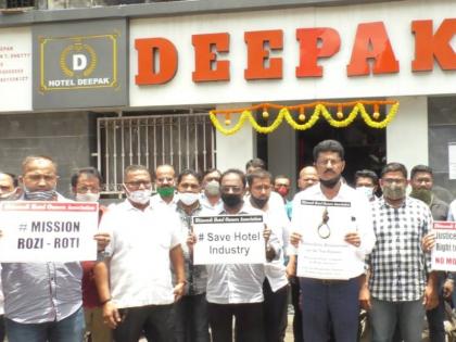 Silent protests by hoteliers in Bhiwandi Demand for extension of time for hoteliers | भिवंडीत हॉटेल व्यवसायिकांची मूक निदर्शने; हॉटेल चालकांना वेळ वाढवून देण्याची मागणी 