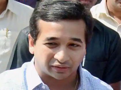 Video: Ratnagiri-Sindhudurg MP removes mask and sneezes in meeting; Nitesh Rane slapped | Video: शिवसेनेचे खासदार भर बैठकीत मास्क काढून शिंकले; नितेश राणेंनी शद्बांत 'चोपले'