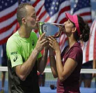 Sania-Soret's mixed doubles title | सानिया-सोरेसला मिश्र दुहेरीचे जेतेपद Sania-Soret's mixed doubles title | सानिया-सोरेसला मिश्र दुहेरीचे जेतेपद