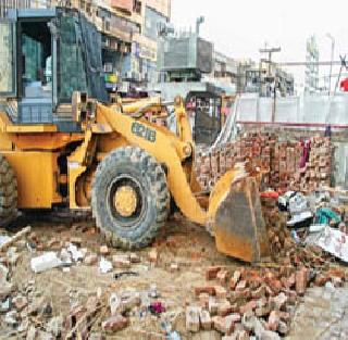 Hammer on encroachment in Kudalwadi | कुदळवाडीत अतिक्रमणावर हातोडा