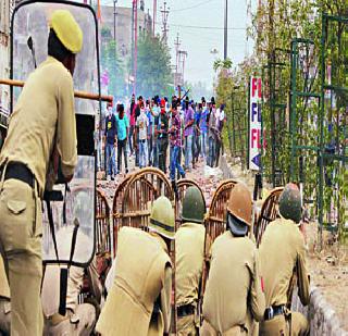 After removing the poster of Bhindranwale, | भिंद्रानवालेचे पोस्टर काढल्याने जम्मू पेटले After removing the poster of Bhindranwale, | भिंद्रानवालेचे पोस्टर काढल्याने जम्मू पेटले