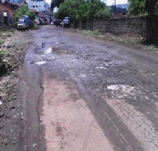 Main road to Nagothane again in the pothole | नागोठणेत मुख्य रस्ता पुन्हा खड्ड्यात