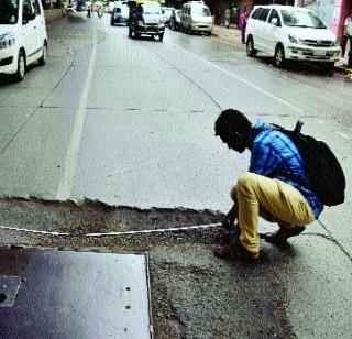 Dr. Astrid pits on the Ambedkar road | डॉ. आंबेडकर मार्गावर अजस्त्र खड्डे