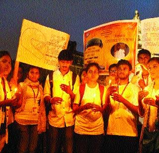 Students' Condole March for Helmets | हेल्मेटसक्तीसाठी विद्यार्थ्यांचे कँडल मार्च