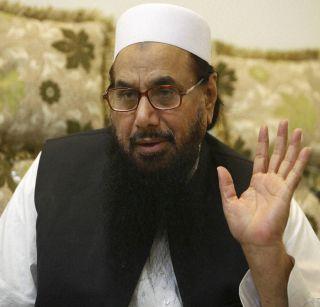 Hafiz Saeed ordered the Pakistan government to lift the stoppage of stay before me | आधी माझ्यावरची प्रवासबंदी उठवा, हाफिज सईदचा पाकिस्तान सरकारला आदेश