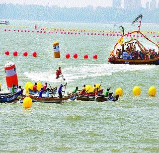 Colors of the Koliwadi race in the race of hockey | होड्यांच्या शर्यतीमध्ये कुलाबा कोळीवाड्याचा जलवा Colors of the Koliwadi race in the race of hockey | होड्यांच्या शर्यतीमध्ये कुलाबा कोळीवाड्याचा जलवा