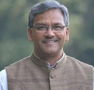 Rawat sworn in | रावत यांचा शपथविधी