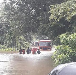 Driver s T. Just put it in the flood water and ... | चालकाने एस. टी. बस पुराच्या पाण्यात घातली अन्...