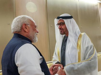 pm narendra modi arrived in abu dhabi on an official visit to the uae | PM मोदी अबुधाबीला पोहोचले, राष्ट्राध्यक्षांनी गळाभेट घेत स्वागत केले; दिला ‘गार्ड ऑफ ऑनर’