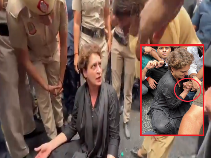 Congress Protest: Priyanka Gandhi twisted a woman policeman's hand during the protest? BJP leader shared photo... | आंदोलनादरम्यान प्रियंका गांधींनी महिला पोलिसाचा हात पिरगळला? भाजप नेत्याने शेअर केला फोटो...