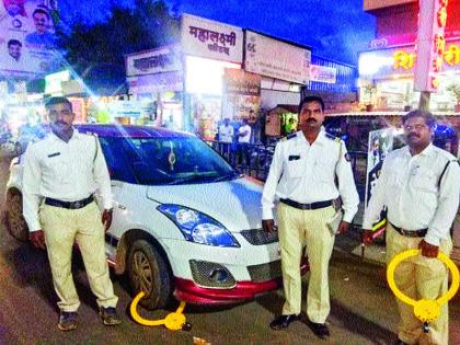 Action on improper parking | चुकीच्या पद्धतीने पार्किंग करणाऱ्यांवर कारवाई