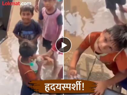 punjab floods kid gives money to rescue worker for providing water bottle heartwarming video goes viral | Video - स्वाभिमानापेक्षा पैसा मोठा नाही! पूरग्रस्त भागातील मुलाने जिंकलं मन, पाणी घेतलं अन्... punjab floods kid gives money to rescue worker for providing water bottle heartwarming video goes viral | Video - स्वाभिमानापेक्षा पैसा मोठा नाही! पूरग्रस्त भागातील मुलाने जिंकलं मन, पाणी घेतलं अन्...
