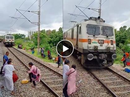 "Khatron Ke Khiladi": Video Shows Woman Crossing Railway Track Seconds Before Train's Arrival | भरधाव वेगाने एक्सप्रेस येत असताना महिलेने दोनदा क्रॉस केला रेल्वे ट्रॅक! शेवट धडकी भरवणारा